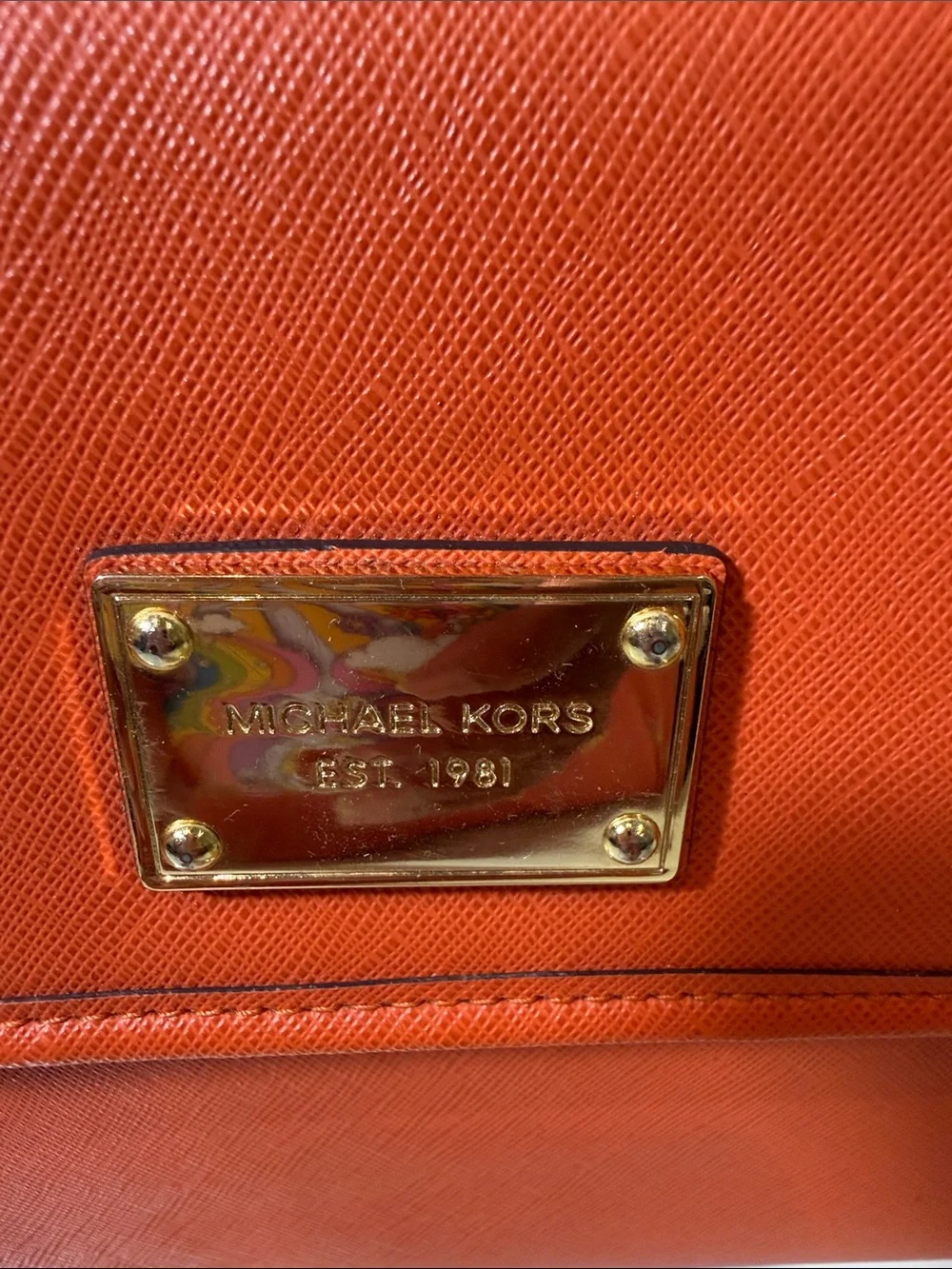 Michael Kors see orange leather
